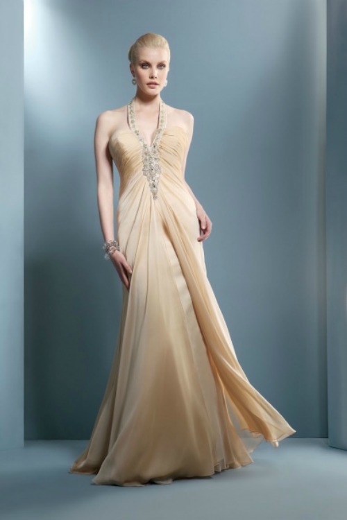 Long dress with jeweled neckline and fluid embedded. Collection Demetrios 2012